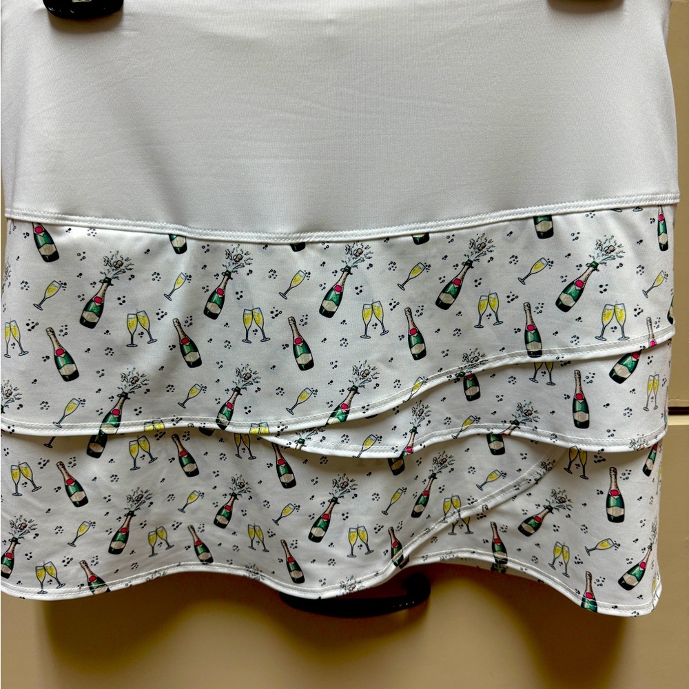 Lucky in Love Champagne tennis skirt. Size large - perfect condition!